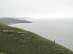 SX08015 Wouko walking on cliff towards Southerndown.jpg